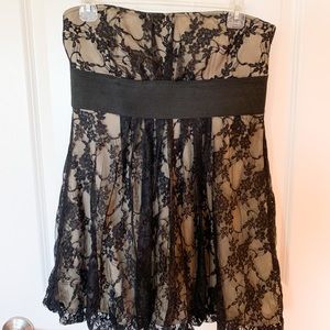 Never worn black lace strapless mini dress size L